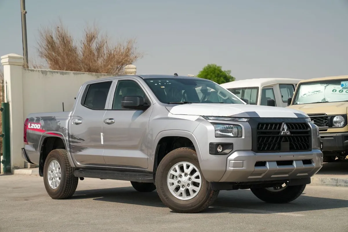 Mitsubishi L200 - фото 1