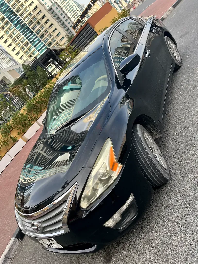 Nissan Altima - фото 1