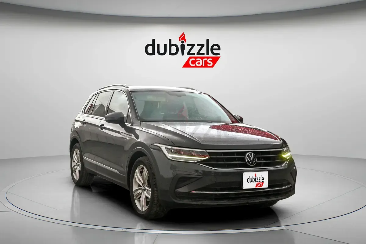 Volkswagen Tiguan - фото 1