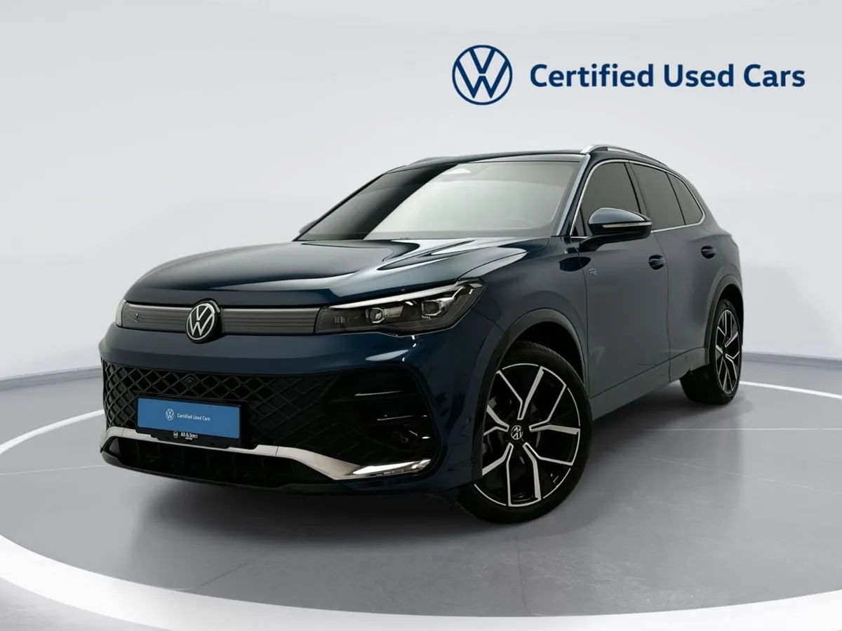 Volkswagen Tiguan - фото 1