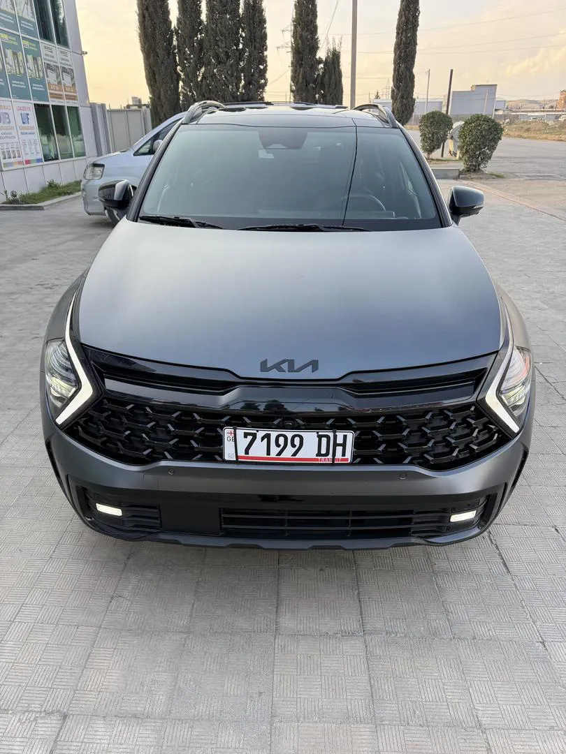 Kia Sportage - фото 1