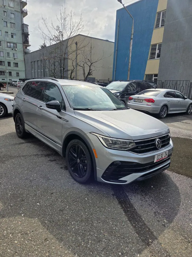 Volkswagen Tiguan - фото 1