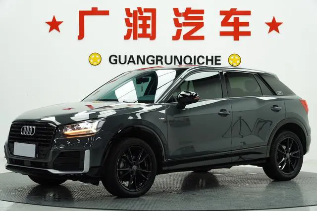 Audi Q2L - фото 1