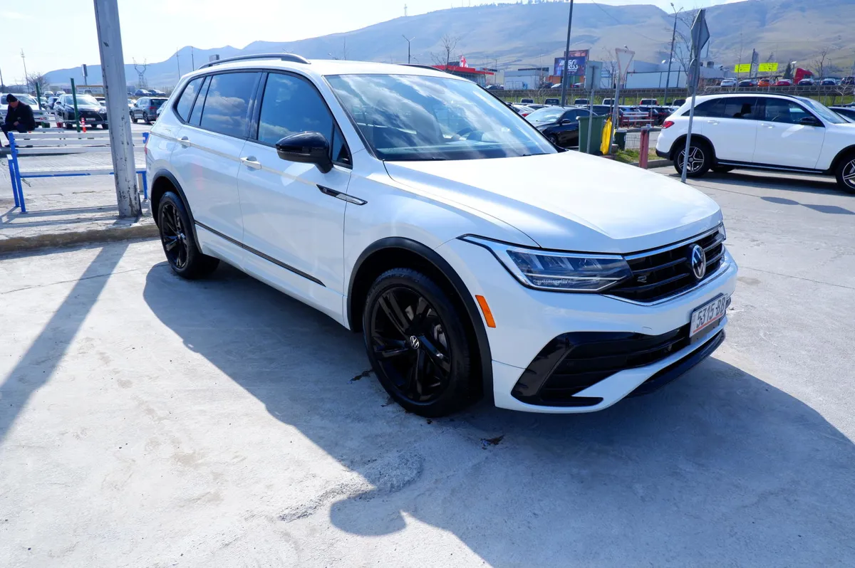 Volkswagen Tiguan - фото 1