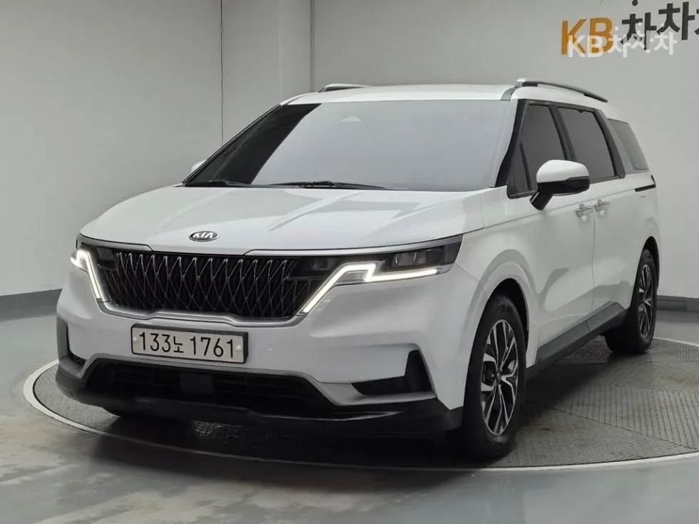 Kia 카니발 4세대 D2.2 9인승 프레스티지 - фото 1
