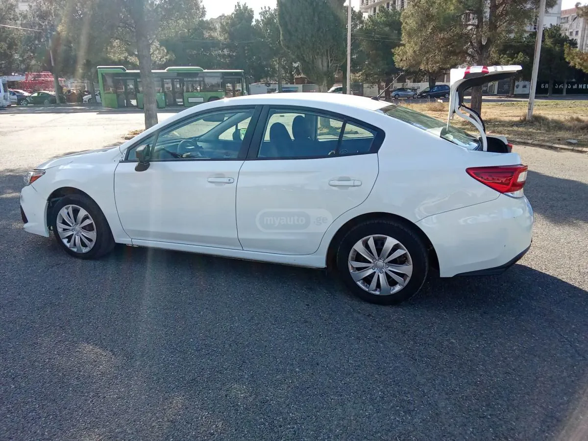 Subaru Impreza - фото 1