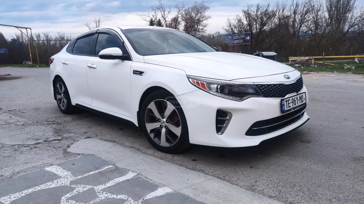 Kia Optima - фото 1
