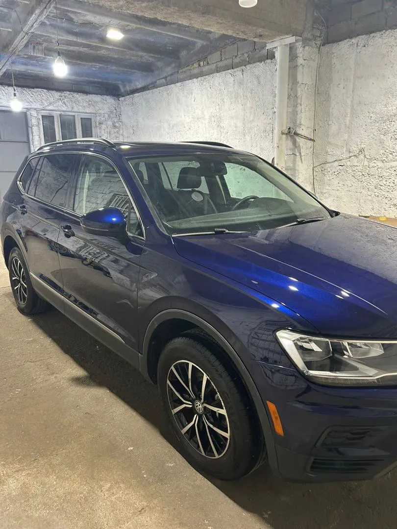 Volkswagen Tiguan - фото 1