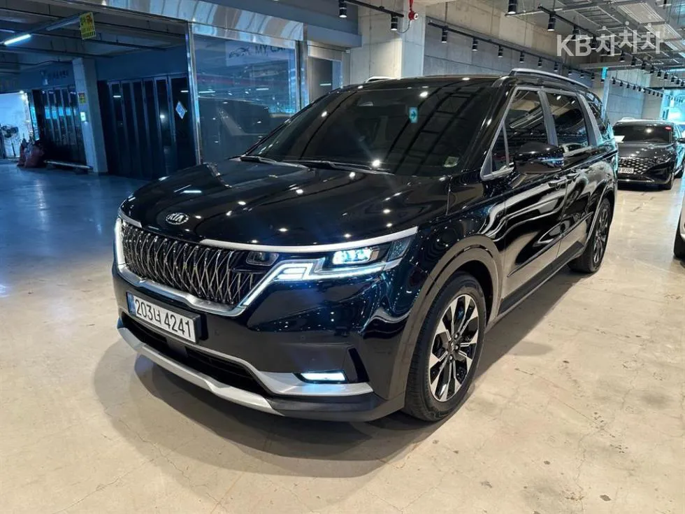 Kia 카니발 4세대 D2.2 9인승 프레스티지 - фото 1