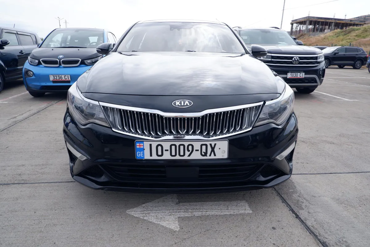 Kia Optima - фото 1