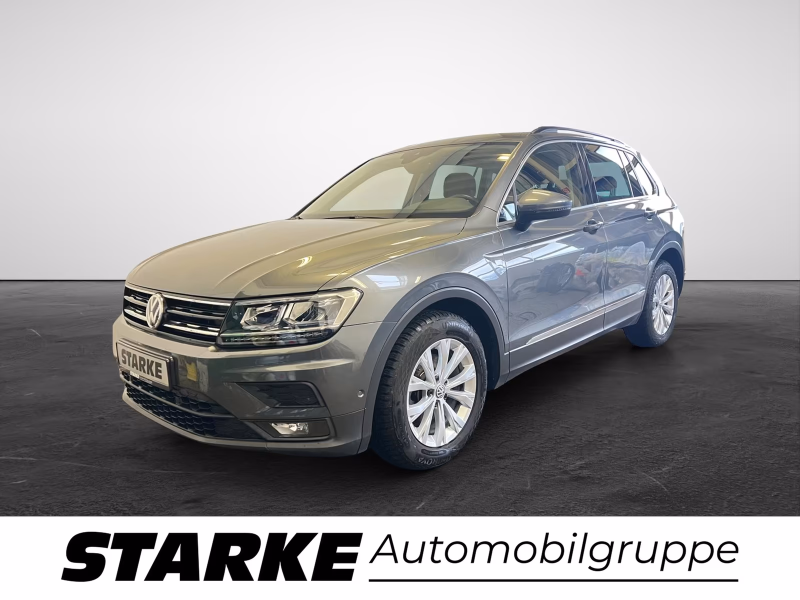 Volkswagen Tiguan - фото 1
