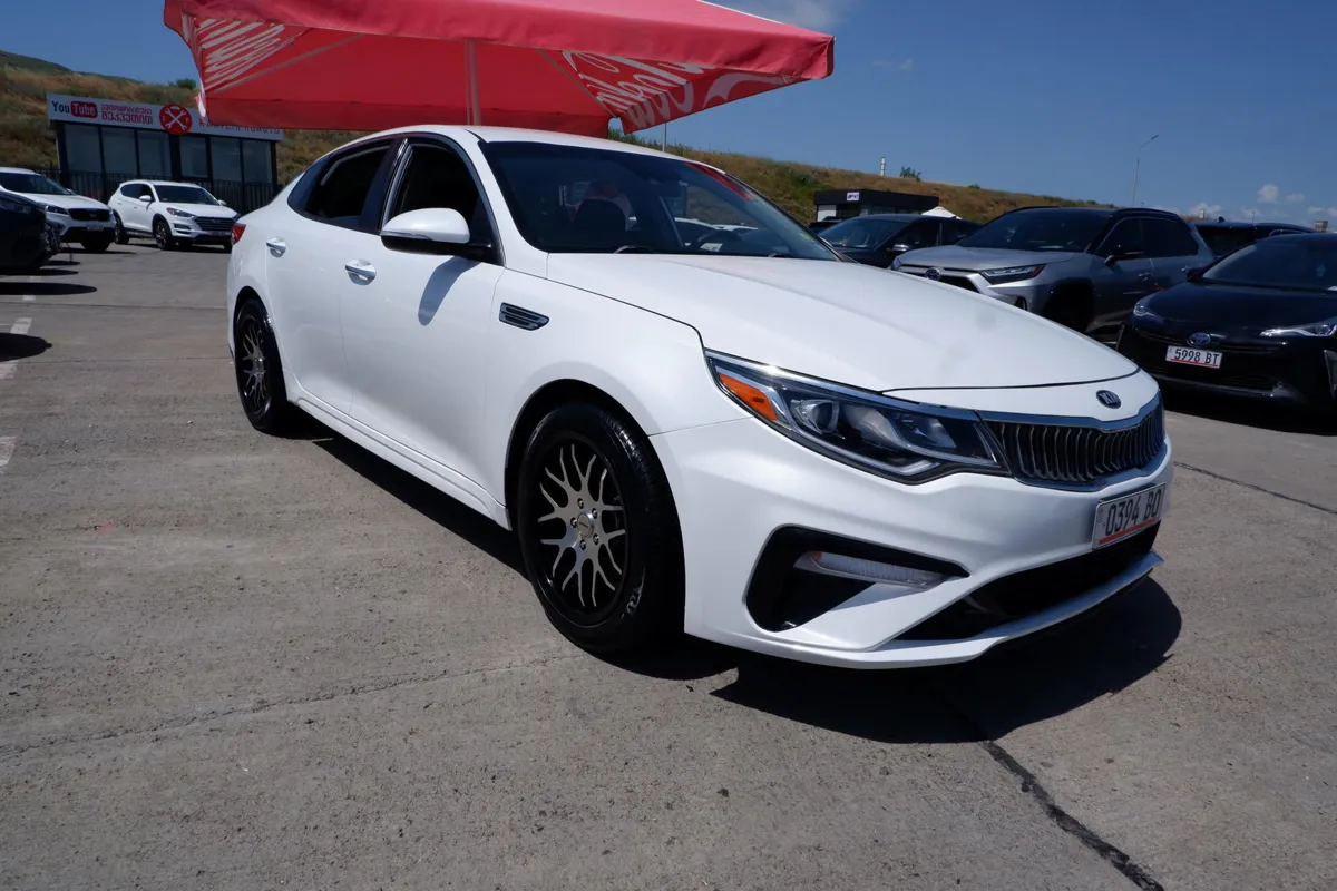 Kia Optima - фото 1