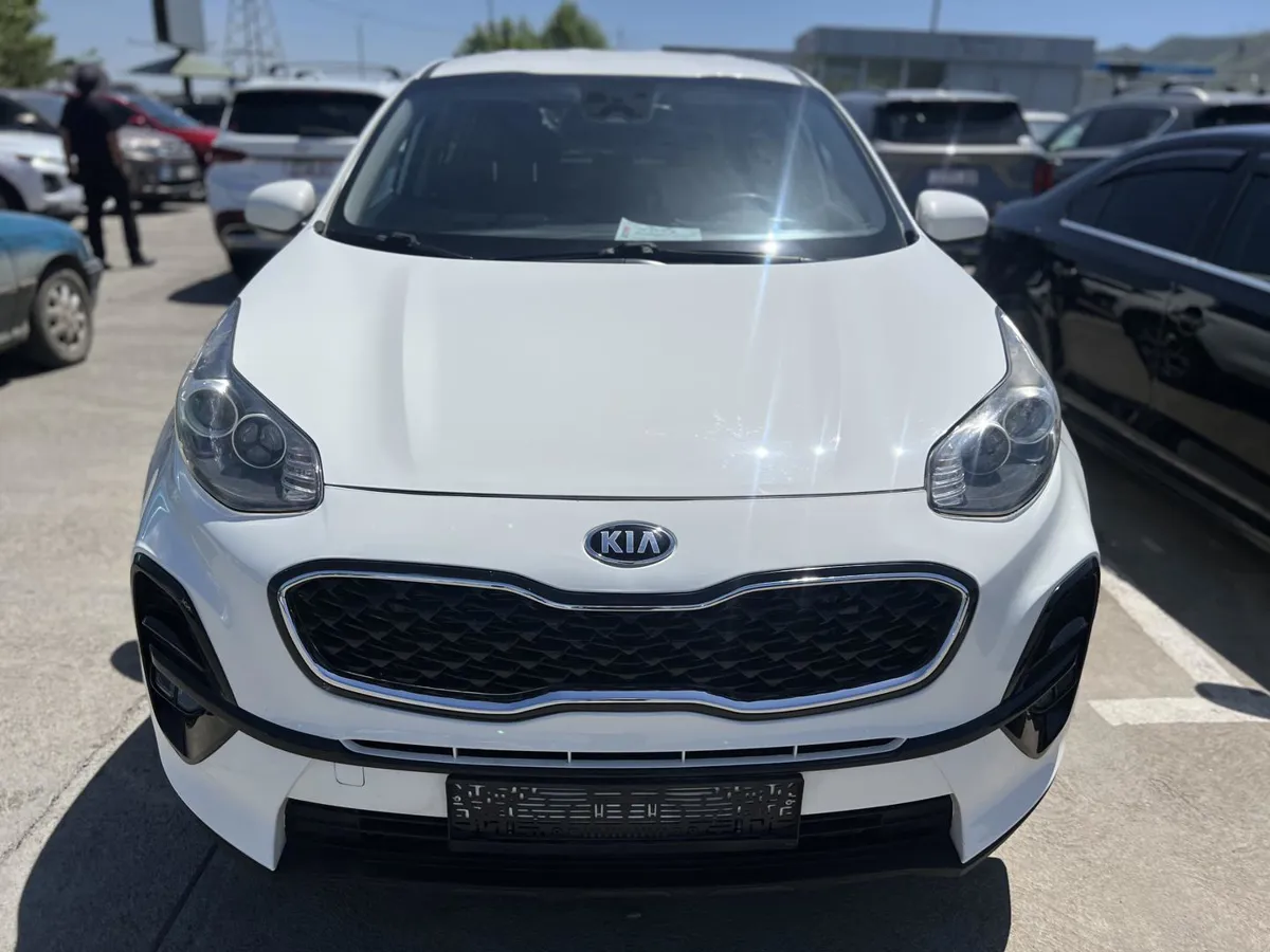 Kia Sportage - фото 1