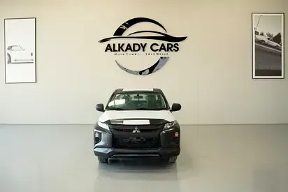 Mitsubishi L200 - фото 1