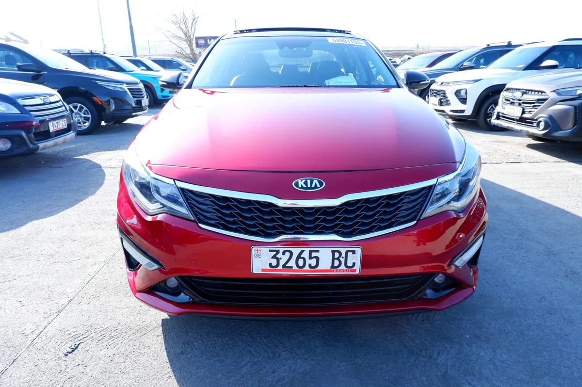 Kia Optima - фото 1