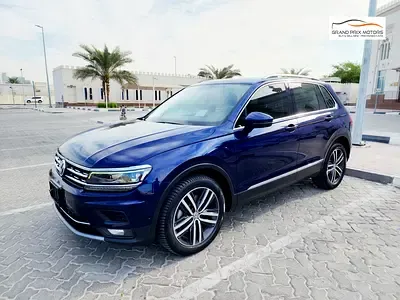 Volkswagen Tiguan - фото 1