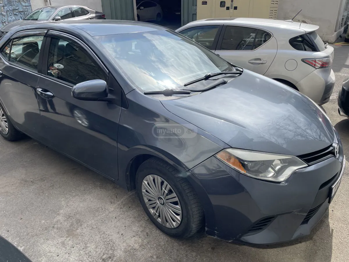 Toyota Corolla - фото 1