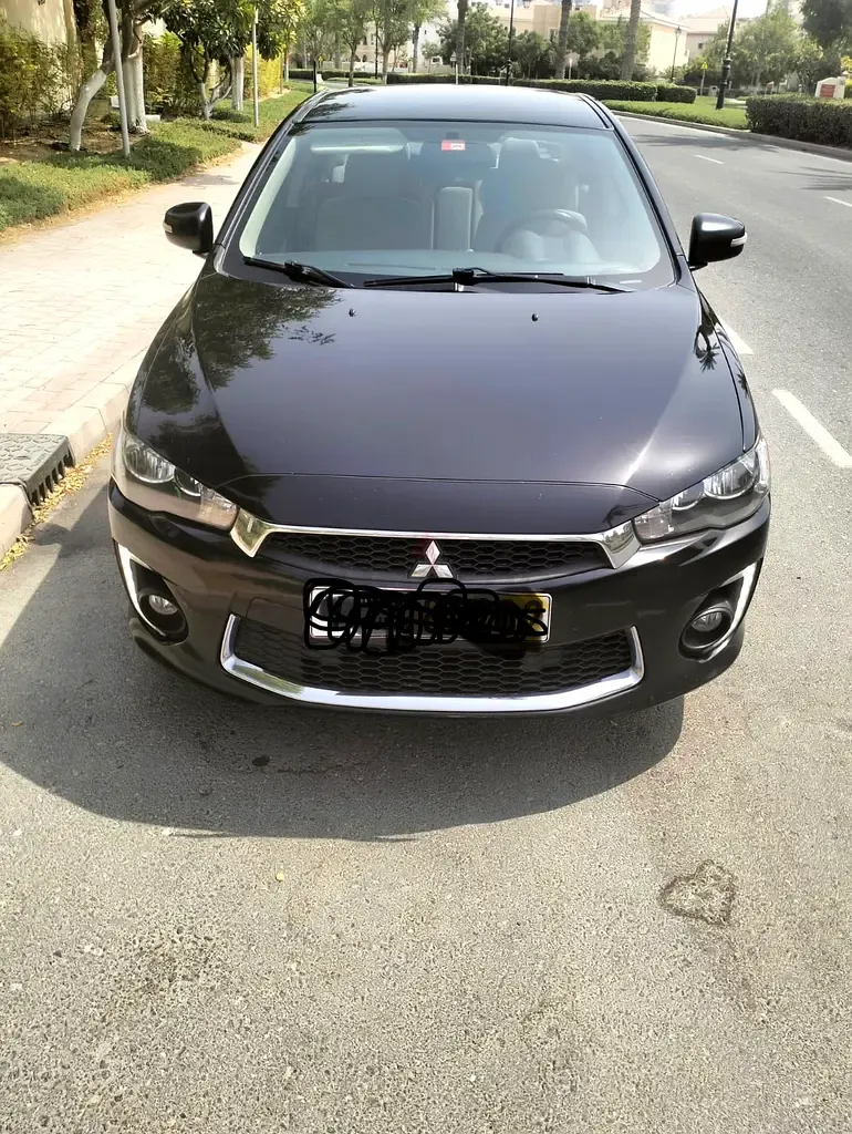 Mitsubishi Lancer EX - фото 1