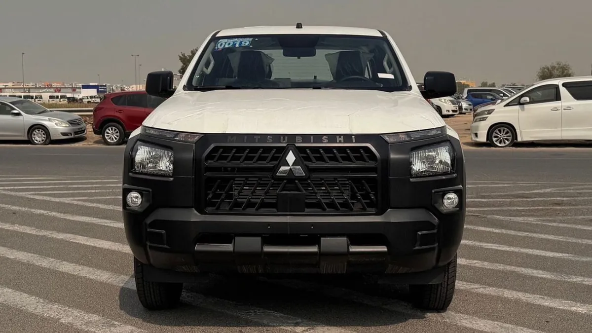 Mitsubishi L200 - фото 1