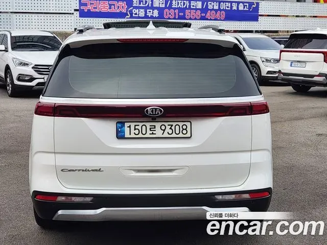 Kia Canival - фото 1