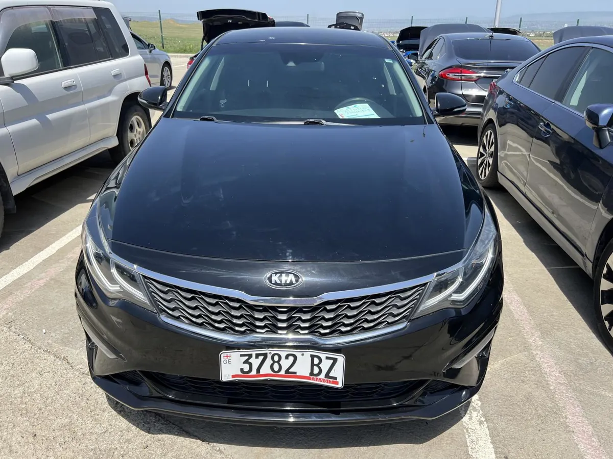 Kia Optima - фото 1