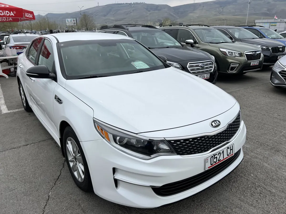 Kia Optima - фото 1