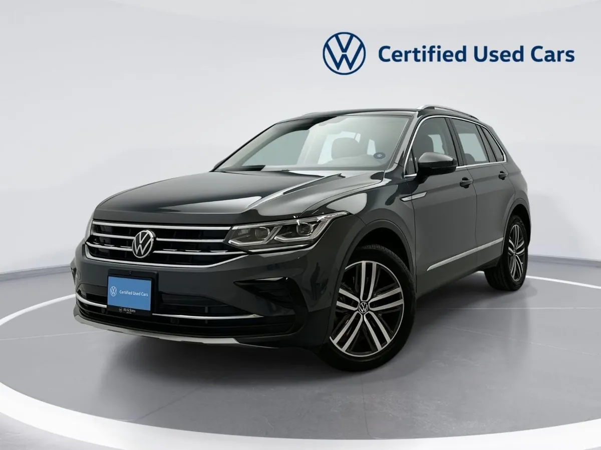 Volkswagen Tiguan - фото 1