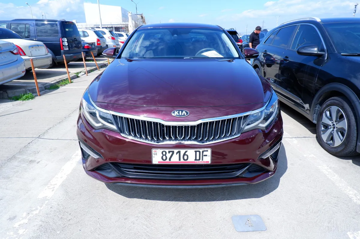 Kia Optima - фото 1