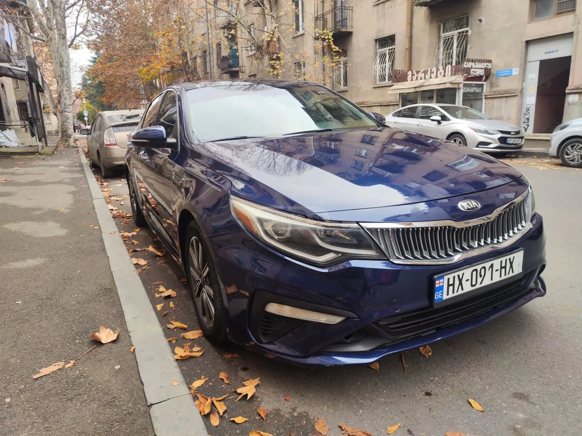Kia Optima - фото 1