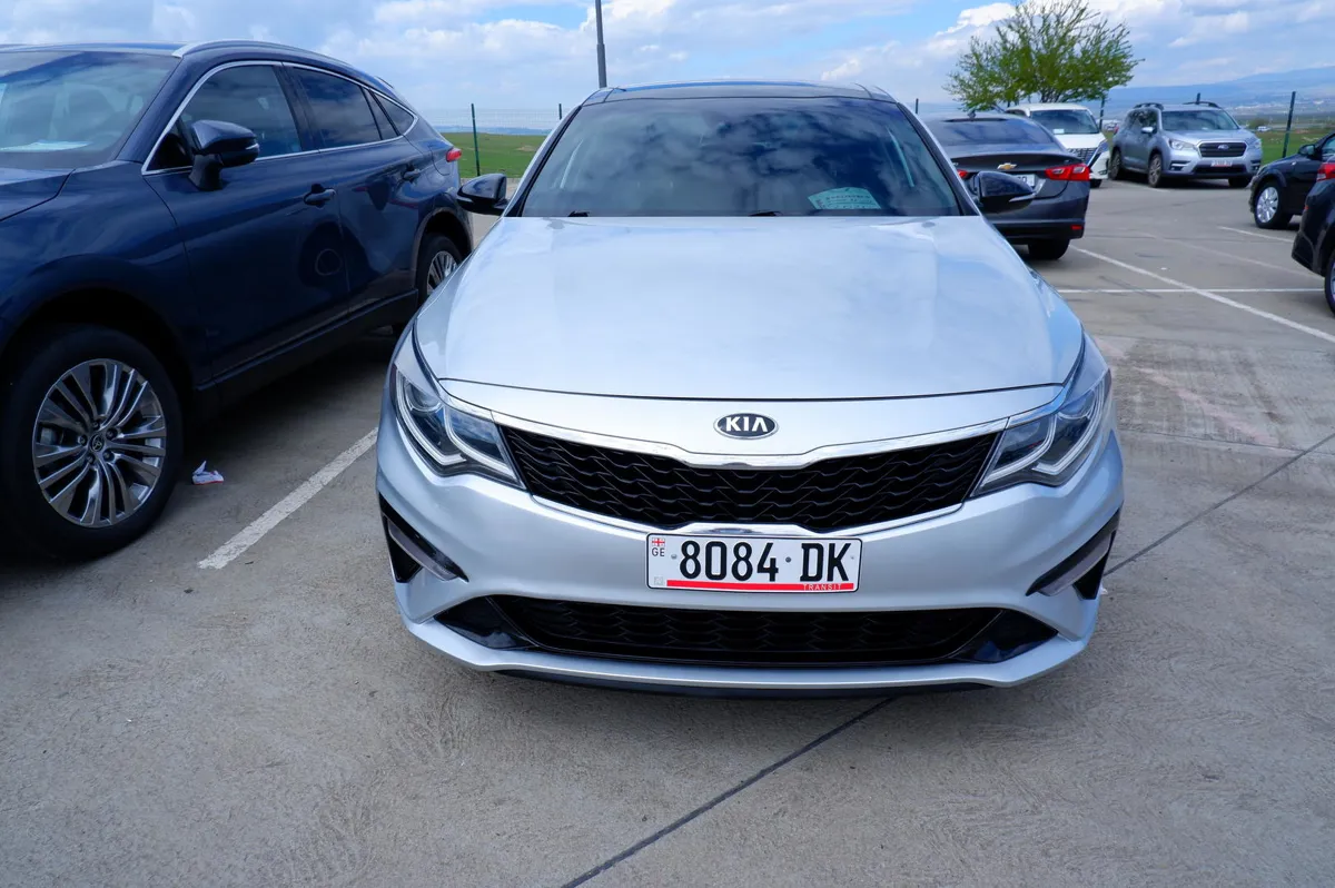 Kia Optima - фото 1