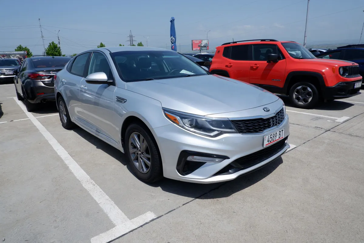 Kia Optima - фото 1