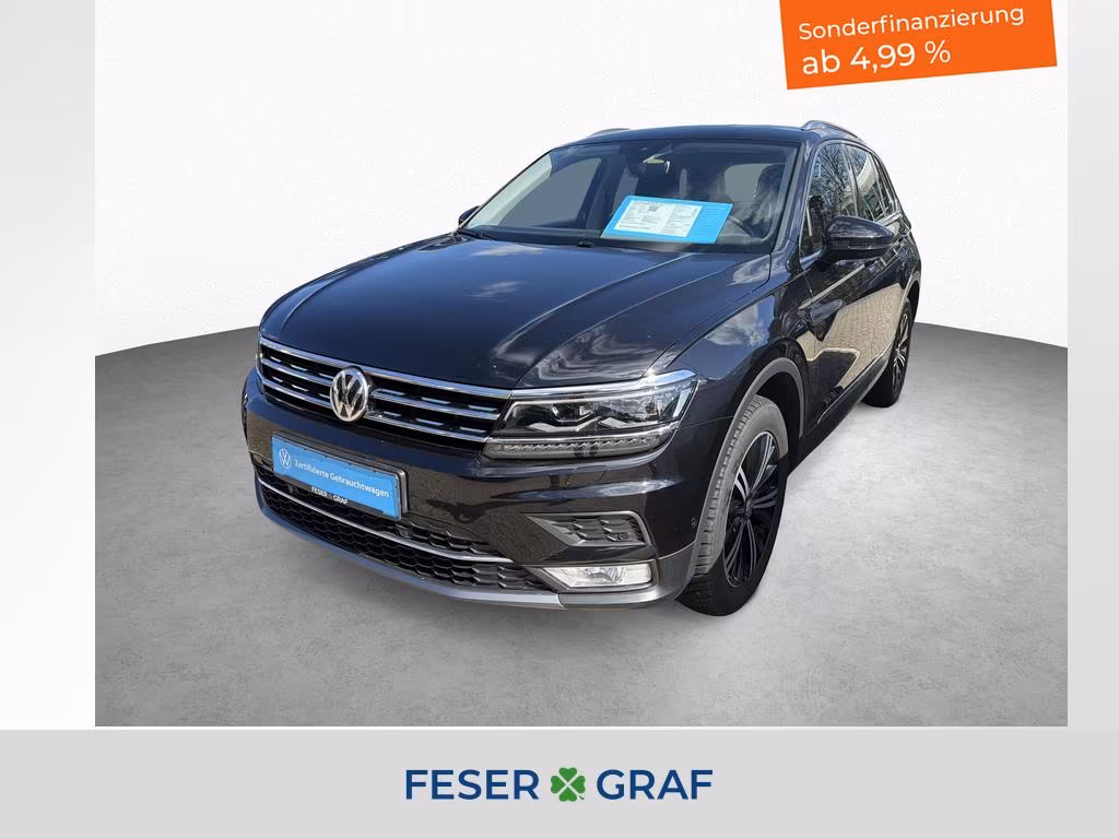 Volkswagen Tiguan - фото 1