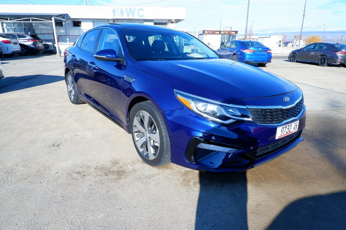 Kia Optima - фото 1