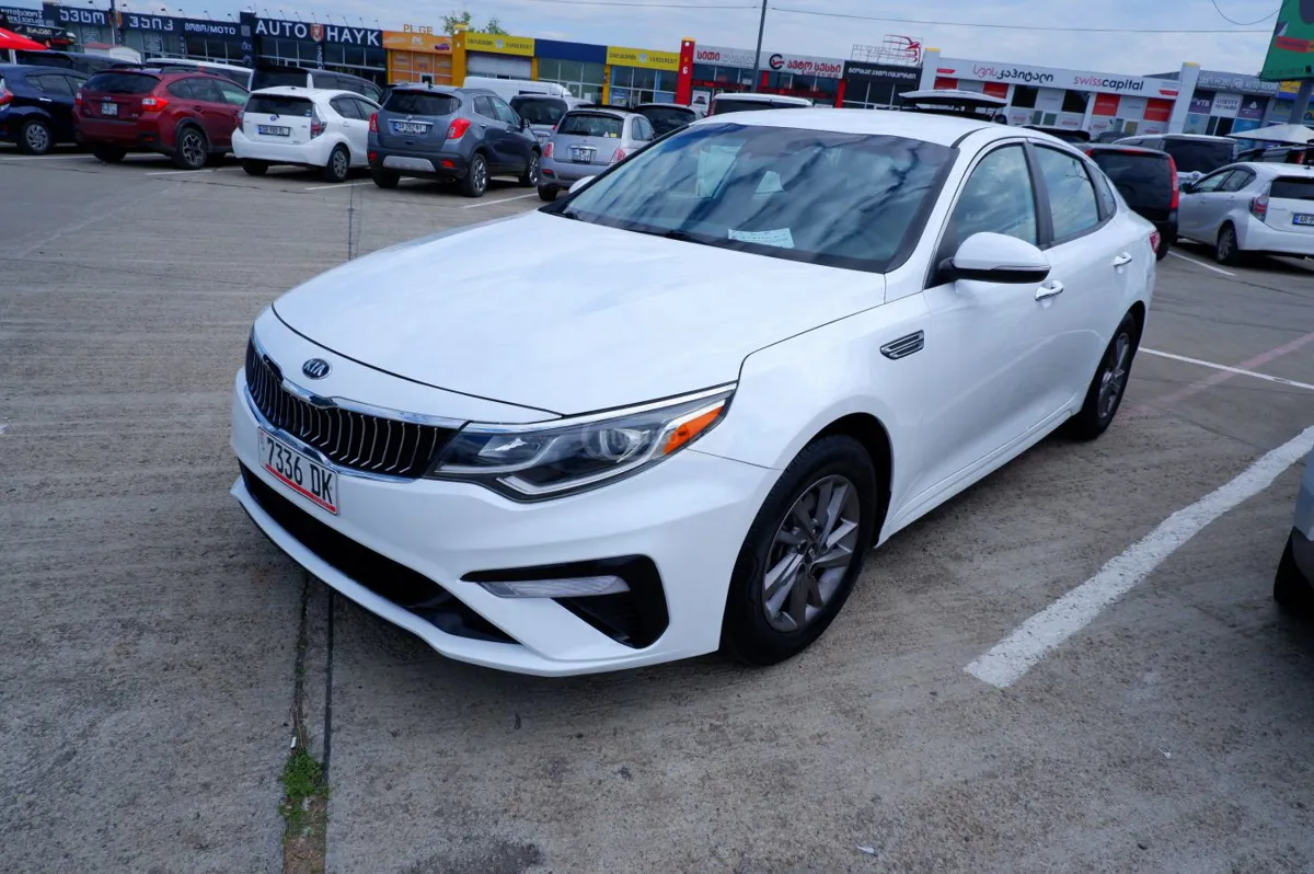 Kia Optima - фото 1