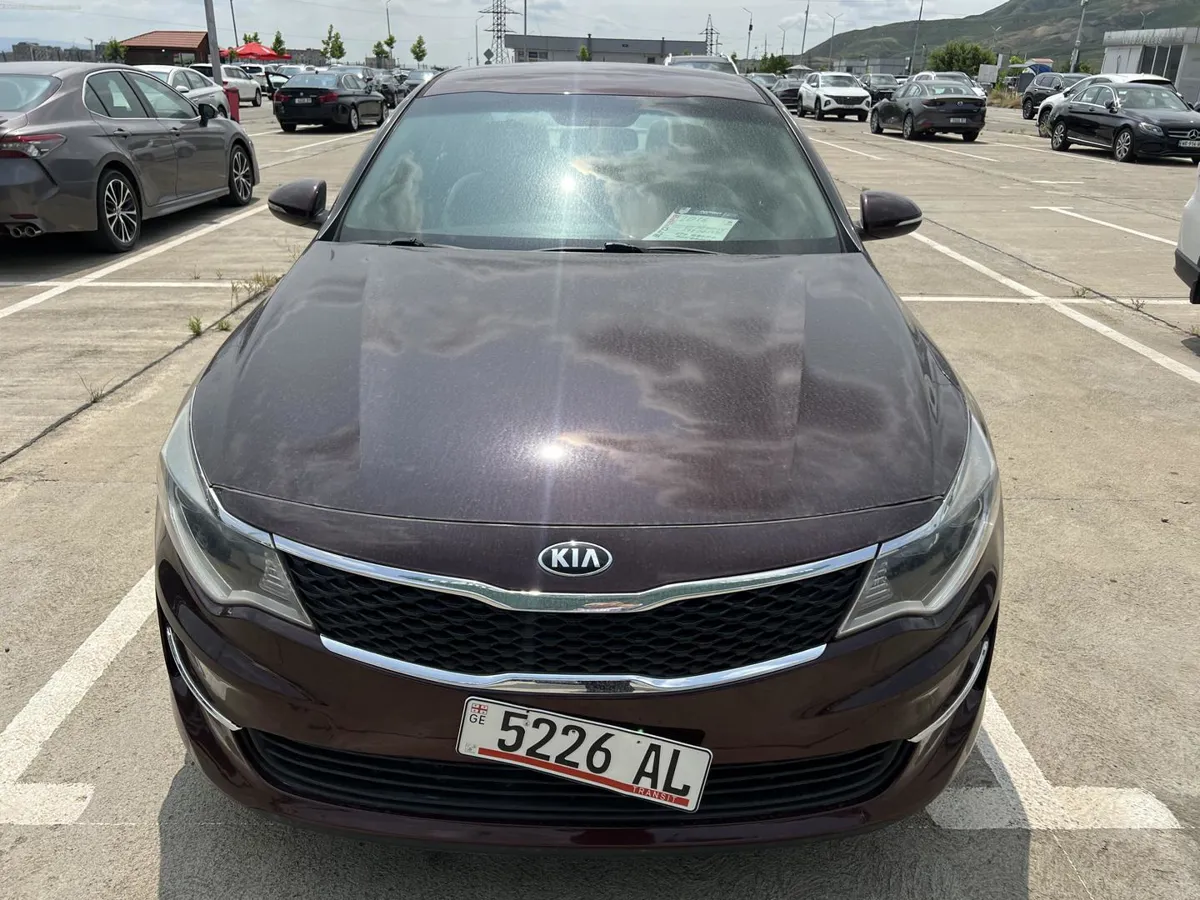 Kia Optima - фото 1