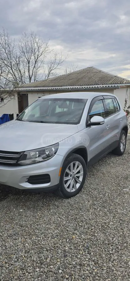 Volkswagen Tiguan - фото 1