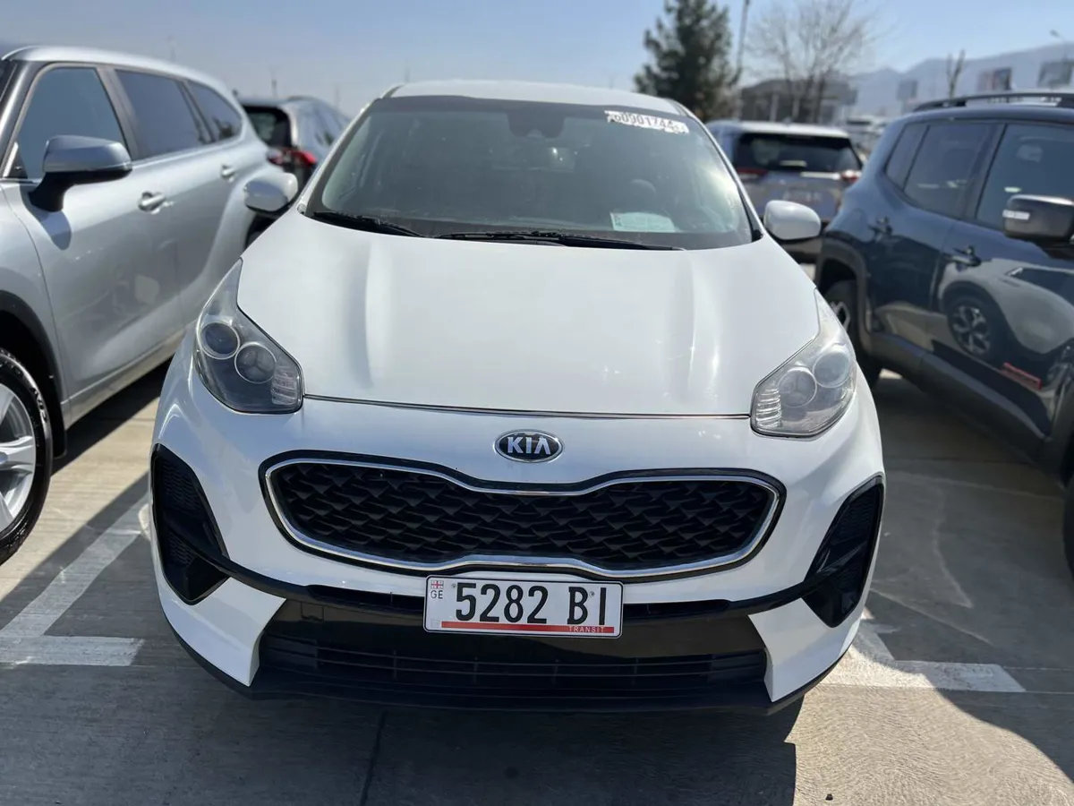 Kia Sportage - фото 1