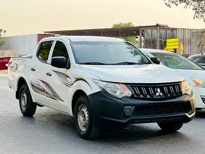 Mitsubishi L200 - фото 1
