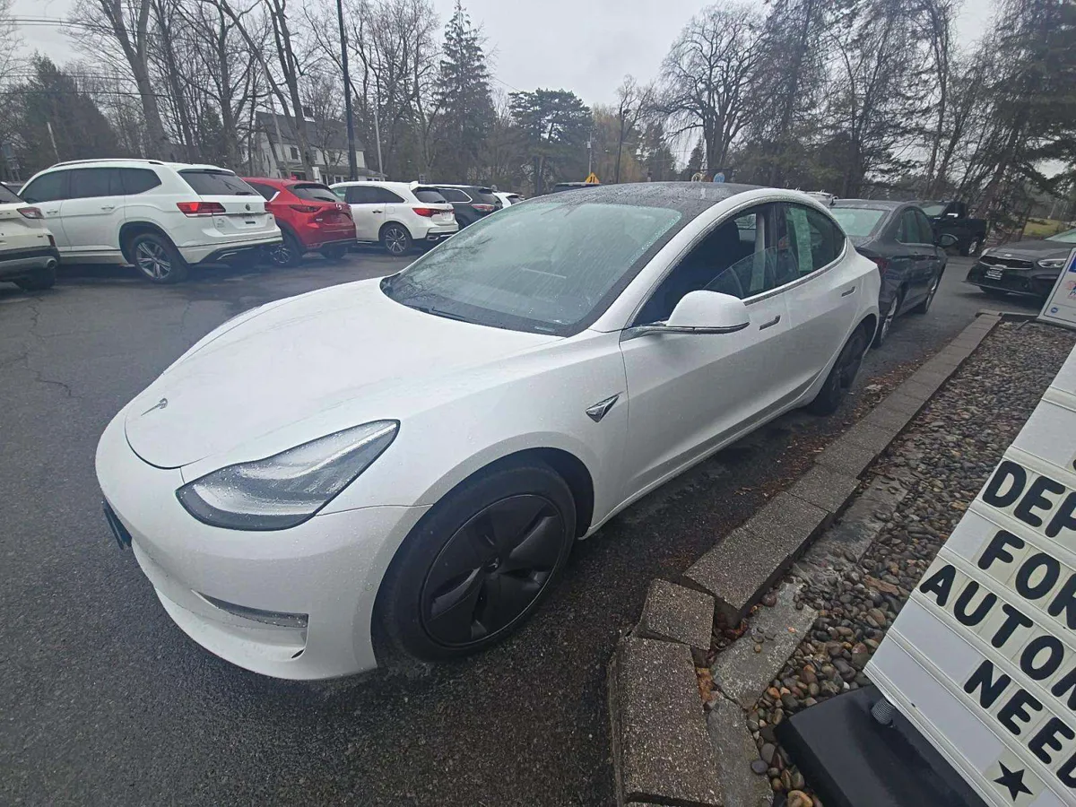 Tesla Model 3 Long Range - фото 1