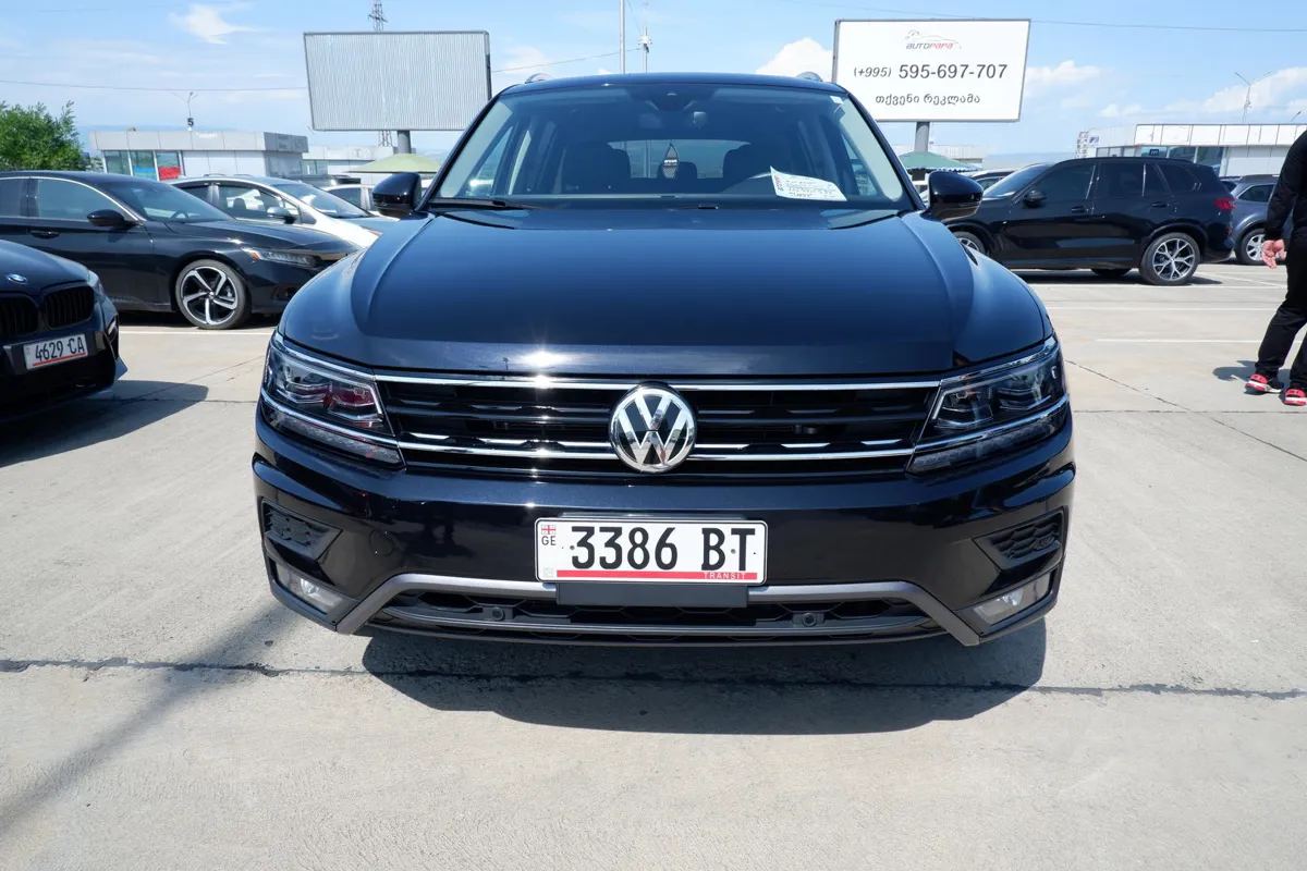 Volkswagen Tiguan - фото 1