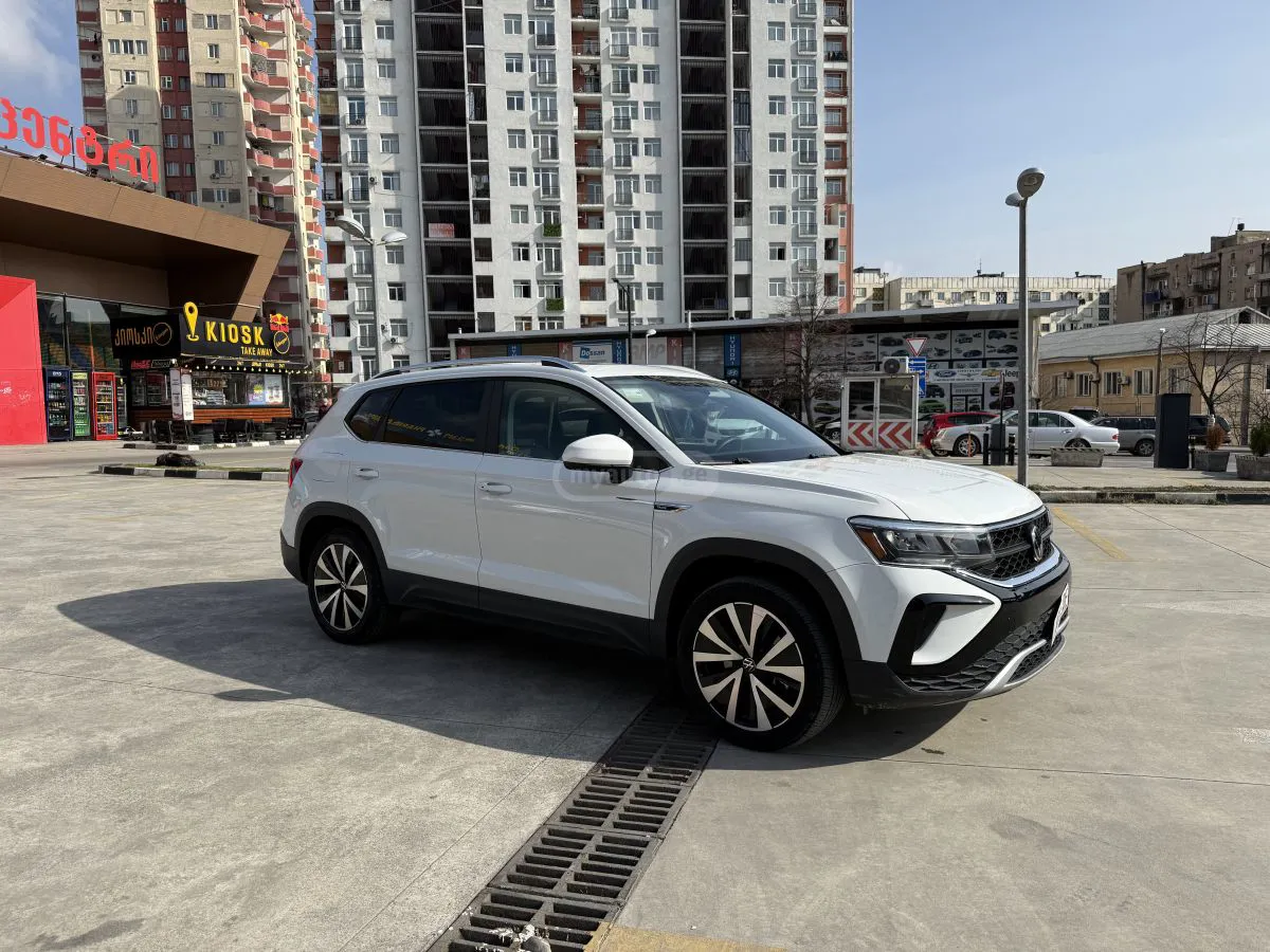 Volkswagen Taos - фото 1