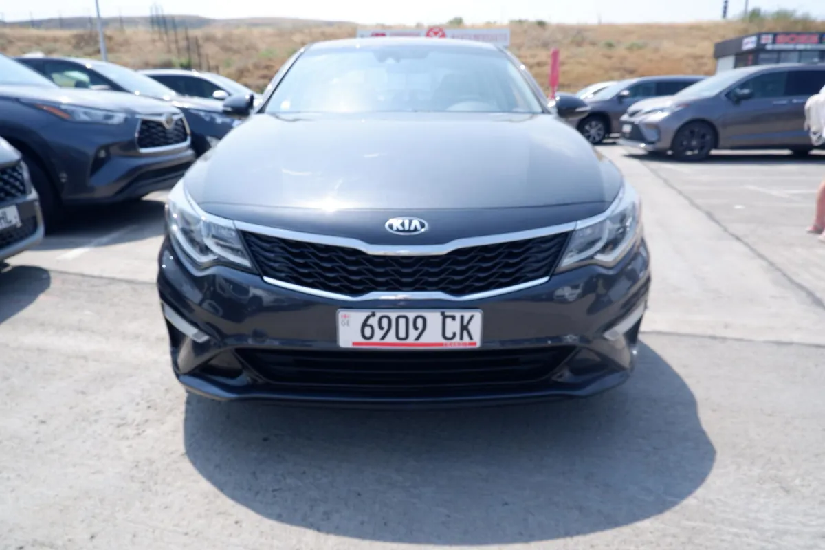 Kia Optima - фото 1