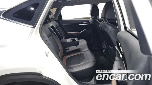 Kia Seltos - фото 1